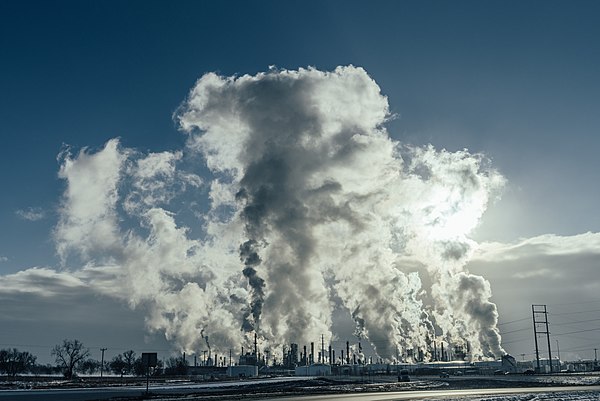 Plumes of steam rise above the Pine Bend oil refinery in Rosemount, Minnesota, run by Flint Hills Resources, a subsidiary of Koch Industries.