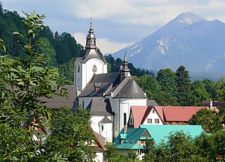 Poronin, is a village in southern Poland situated in Tatra County of the Lesser Poland Voivodeship since 1999. It lies approximately 7 kilometres (4 mi) north-east of Zakopane and 80 km (50 mi) south of the regional capital Kraków.