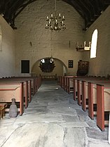 Sakshaug old church interior eastwards.jpg