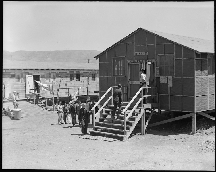 File:San Bruno, California. Early comers to a mid -day meal. There are eighteen such mess halls which, . . . - NARA - 537921.tif