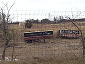 Old Simpsons department store trailers from 1960 on a field outside Whitby, Ontario Simpsons truck trailers.jpg