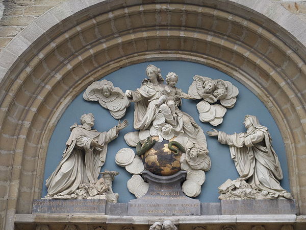 Tympanum sculpture of Our Lady of the Rosary by Jan Claudius de Cock