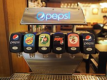 Soft drink taps in a restaurant in Sweden with lingonberry juice as second from right. Soft drink taps at restaurant Thai Silk.jpg