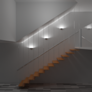 Beispiel für eine unsachgemäße Treppenbeleuchtung: Während die Stufen im Dunkeln liegen, lenken die Wandleuchten den Blick nach oben.