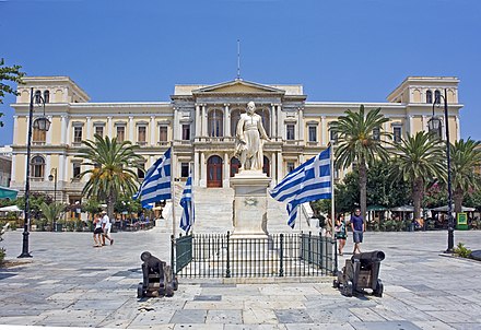 Ermoupolis City Hall, designed by Ernst Ziller, with the statue of Andreas Miaoulis (work of Georgios Bonanos)