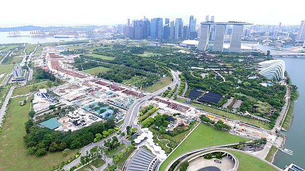 Station under construction in 2017 with the Marina Bay Sands and the Gardens by the Bay in the background. The construction site of Marina South stati