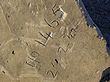 part of tank trap at the northern end of Stockton Beach in Anna Bay showing the World War II date stamp