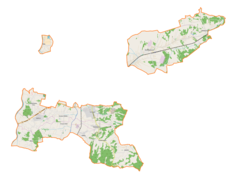 Mapa konturowa gminy wiejskiej Tarnów, na dole znajduje się punkt z opisem „Poręba Radlna”