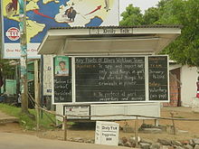 The Daily Talk is a street blackboard announcing news on Monrovia's Tubman Boulevard. The Daily Talk.jpg