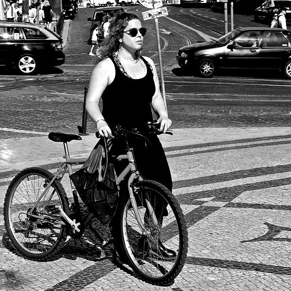 File:The girl and her bicycle (26023296372).jpg