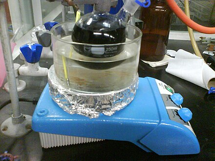 After: The deep blue coloration of the benzophenone ketyl radical shows that the toluene to be distilled is dry and oxygen-free.