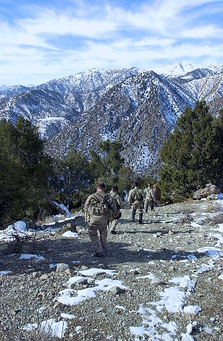 U.S. Navy SEALs searching for Taliban (and Al-Qaeda) members in February 2002