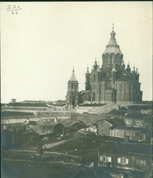 Old wooden houses in Katajanokka in the 1860s. In the background is the Uspenski Cathedral which had just been completed at the time. Photograph by E. Hoffers in 1868. Uspenskin katedraali 1868 edited-1.tif