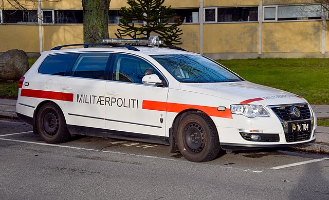 Danish label reading militærpoliti, "military police", on a police vehicle