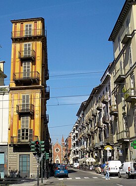 view of via Giulia di Barolo with the building called slice of polenta, Torino