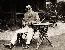 Grace on his 66th birthday, 1914 Wg grace and dog 1914.jpg
