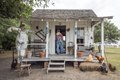 "Uncle Bob" Beringer, a historical interpreter, is photographed on an authentic early-Texas sharecropper's cabin on the George Ranch Historical Park, a 20,000-acre working ranch in Fort Bend County, LCCN2014632560.tif