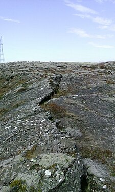 Cracks form in the roof of lava tubes.