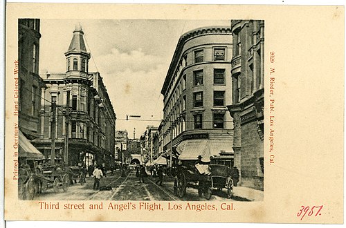 1903, looking west on Third past Spring: Desmond's store located 1900–1906 in the turreted Ramona Block on the SW corner, left, and Southern Pacific Railroad office in the Douglas Building, still standing today, on the NW corner, right. At far background, Angel's Flight at 3rd and Hill.