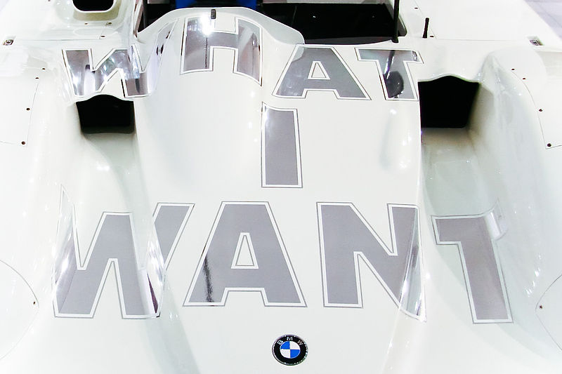 File:1999 BMW V12 LMR Art Car by Jenny Holzer - What I want.jpg