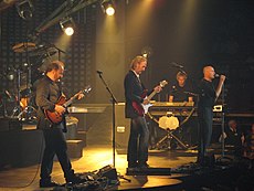 English rock band Genesis ended 1991 at number one with "No Son of Mine", which spent a total of five weeks atop the chart. 2180 - Pittsburgh - Mellon Arena - Genesis - The Carpet Crawlers.JPG