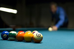 Matter's mass strongly influences many familiar kinetic properties, such as the motion of billiard balls. 8ball break.jpg