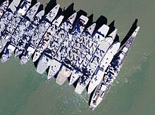 Cimarron laid up at Suisun Bay (third ship from the right). Aerial view of USS Iowa (BB-61) and other ships laid-up in Suisun Bay, California (USA), circa in the early 2000s.jpg