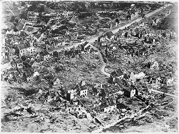 The loss of life and harms of war are cited as a reason for the illegality of aggression. Pictured: aerial view of the ruins of Vaux, France, 1918.