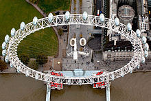 The Eye on the South Bank of the Thames, with Jubilee Gardens (left) and County Hall (right) in the background Aerial view of the London Eye. MOD 45146076.jpg