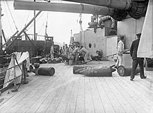 Loading shells aboard the ship during the war Ammunitioning HMS Emperor of India WWI IWM SP 1872.jpg