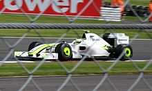 Rubens Barrichello completed the podium with third, finishing ahead of Brawn GP teammate Jenson Button for the first time in 2009. Barrichello 2009 British GP 1.jpg