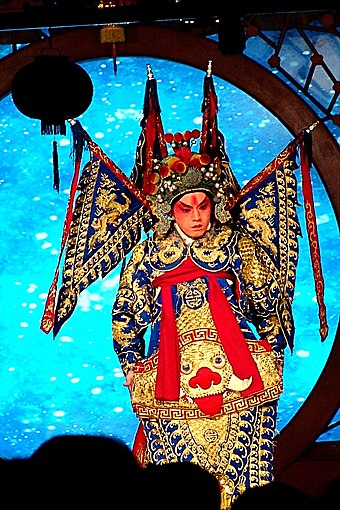 A Beijing opera performer with traditional stage make up.