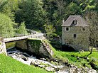 Boussac (Creuse) - Site avec la rivière Beroux, le moulin et le pont.JPG