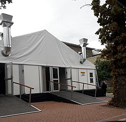 A COVID-19 testing tent at the Paarl Provincial Hospital COVID-19 testing tent at the Paarl Provincial Hospital in Paarl, Western Cape, SA.jpg