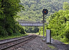Searchlight type automatic block signal at Milepost 122.2 on the Reading Blue Mountain and Northern Railroad Lehigh Line (former Lehigh Valley Railroad) in Jim Thorpe, Pennsylvania CR Lehigh-Line-signal-1222.jpg