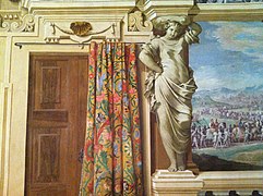 La Sala de las virtudes de los sentidos con frescos ilusionistas que representan cariátides de Boulanger. La sala estaba destinada a inspirar un gobierno sólido en nombre del duque.