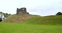 The motte (left) and bailey (right) of Clough Castle in County Down in Northern Ireland Clough Castle Motte and Bailey.jpg