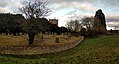 Cuckney motte and bailey castle, Norton Road, Cuckney (with St Mary's Church in the background)