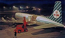 KLM DC-7CF freighter loading cargo in 1964 Douglas DC-7CF PH-DSE KLM RWY 06.11.64 edited-3.jpg