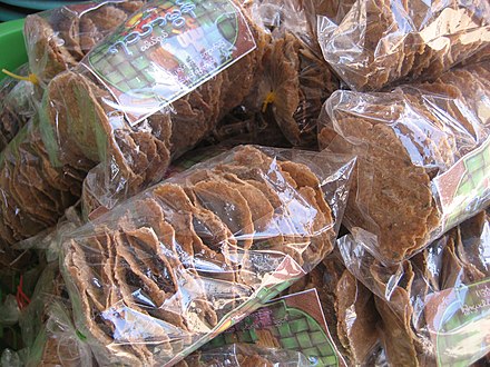 Dried fermented bean cakes called pè bok are grilled or fried in Shan cooking.