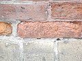 Eroded bricks sw corner of front and frederick, 2013 02 18 -ap.JPG - panoramio.jpg