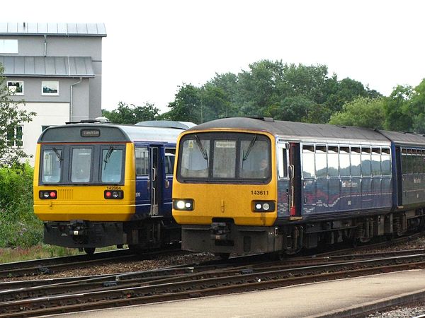 A Class 142 and Class 143 at Exeter St Davids in 2011