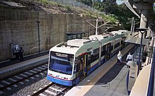 A Sydney Light Rail service in 1997 at Fish Market Fish Market light rail stop 1997 (4731800705).jpg