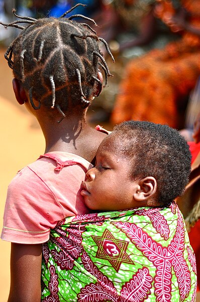 File:Ghana child sleeps at health event (7250640274).jpg