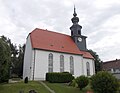 Individual features of the entity: Church with furnishings, enclosure wall and portal of the churchyard, war memorial for the fallen of the First and Second World War, grave field with individual graves for soldiers who died in the Second World War and a DRK sister, tomb for the Junghans family and Lutherlinde - garden monument (see also aggregate document for object 09303813, same address)