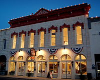 The restored Granbury Opera House was adorned with patriotic decorations during the 2014 Fourth of July festival. Granbury Opera House at Twilight.JPG