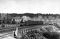 Een locomotief van de serie 1700/1800 met een trein nabij Oosterbeek Laag. (8-8-1938)