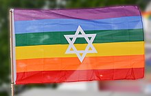 Image of a Gay Pride flag and the Star of David combined. Image of Gay Pride flag and Star of David.jpg