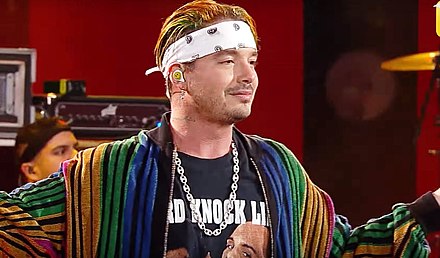 Balvin is noted for his eccentric style, often wearing bright colors and dyeing his hair.