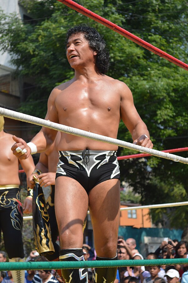 Negro Casas at an outdoor wrestling event.